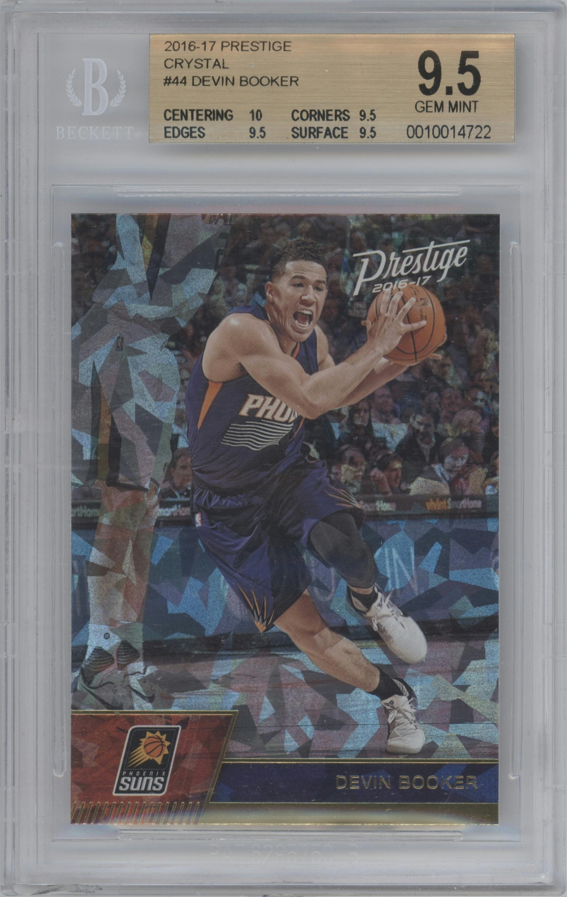 Devin Booker from the 2016-17 Panini Prestige  set featuring a Crystal parallel graded by Beckett and given an overall grade of 9.5.