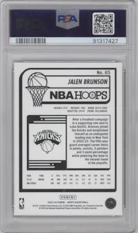 Jalen Brunson from the 2023-24 Panini NBA Hoops set featuring a Hyper Gold  parallel graded by PSA and given an overall grade of 10.