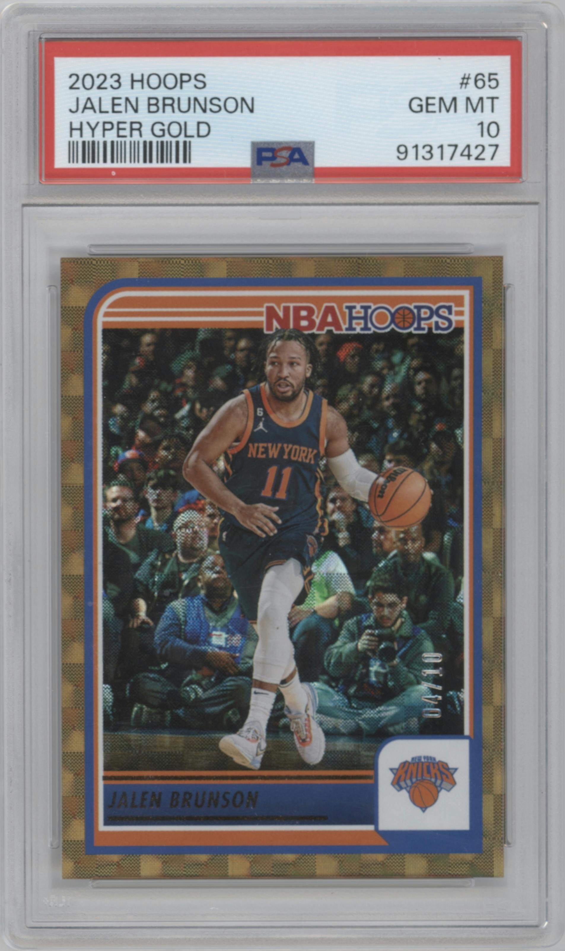 Jalen Brunson from the 2023-24 Panini NBA Hoops set featuring a Hyper Gold  parallel graded by PSA and given an overall grade of 10.