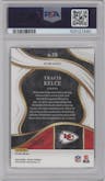 Travis Kelce from the 2023 Panini Select set featuring a Dragon Scale parallel graded by PSA and given an overall grade of 10.