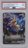 Jolteon VMAX from the 2021 Pokemon SWSH set featuring a Jolteon VMAX Premium Collection parallel graded by PSA and given an overall grade of 9.