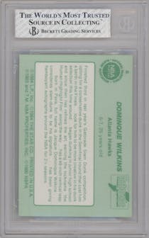 Dominique Wilkins from the 1985 Star Gatorade Slam Dunk set graded by Beckett and given an overall grade of 8.