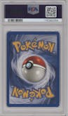 Shining Charizard from the 2002 Pokemon Neo Genesis set graded by PSA and given an overall grade of 5.