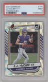 J.J. McCarthy  from the 2024 Donruss set graded by PSA and given an overall grade of 9.