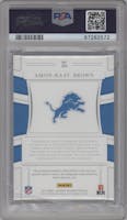 Amon-Ra St. Brown from the 2021 Panini National Treasures set featuring a Purple parallel graded by PSA and given an overall grade of 9.
