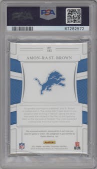 Amon-Ra St. Brown from the 2021 Panini National Treasures set featuring a Purple parallel graded by PSA and given an overall grade of 9.