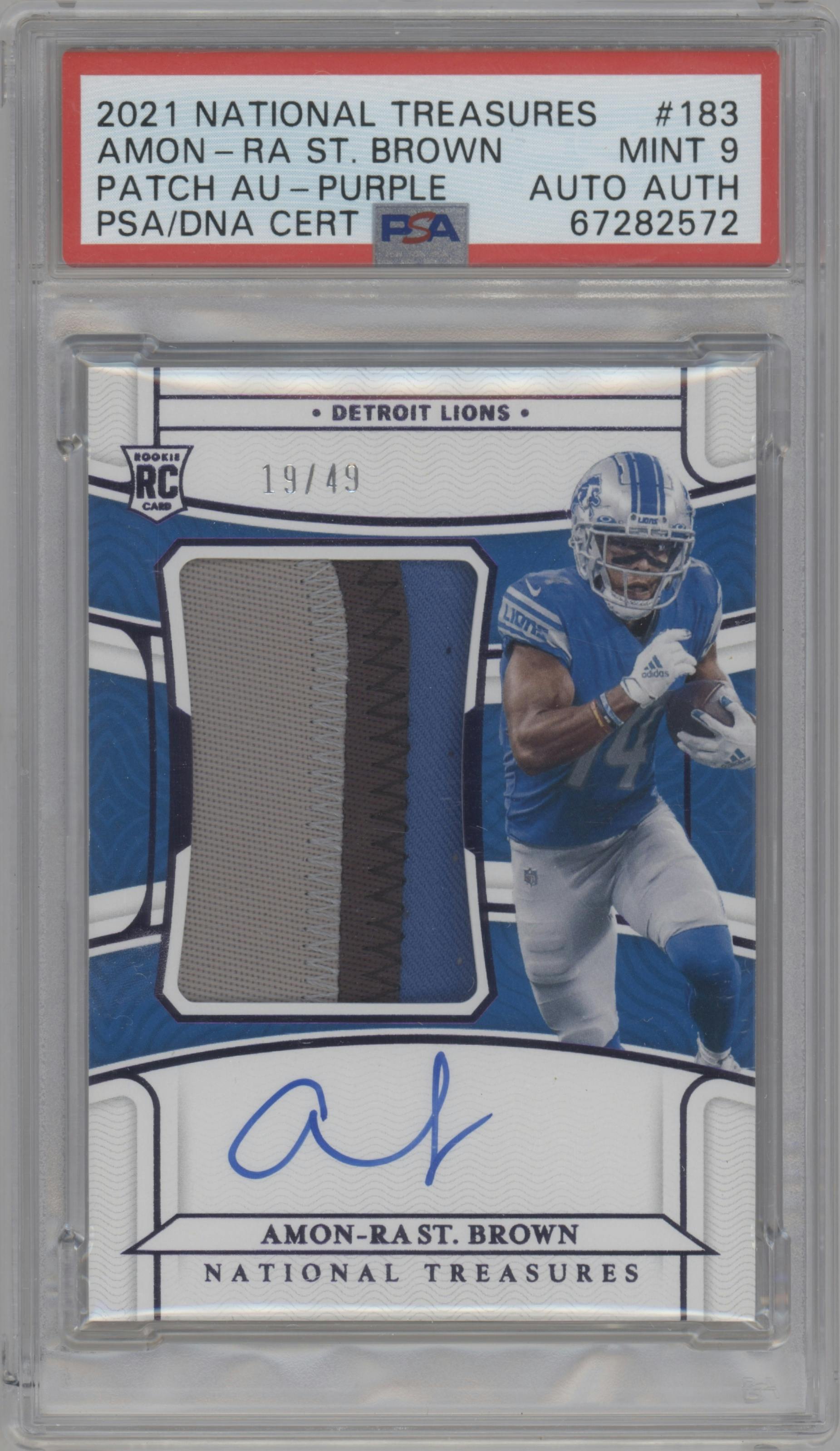 Amon-Ra St. Brown from the 2021 Panini National Treasures set featuring a Purple parallel graded by PSA and given an overall grade of 9.