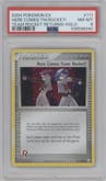 Here Comes Team Rocket! from the 2004 Pokemon EX set graded by PSA and given an overall grade of 8.