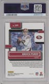 Brock Purdy from the 2022 Panini Donruss Optic set featuring a Pink parallel graded by PSA and given an overall grade of 9.