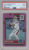 Brock Purdy from the 2022 Panini Donruss Optic set featuring a Pink parallel graded by PSA and given an overall grade of 9.