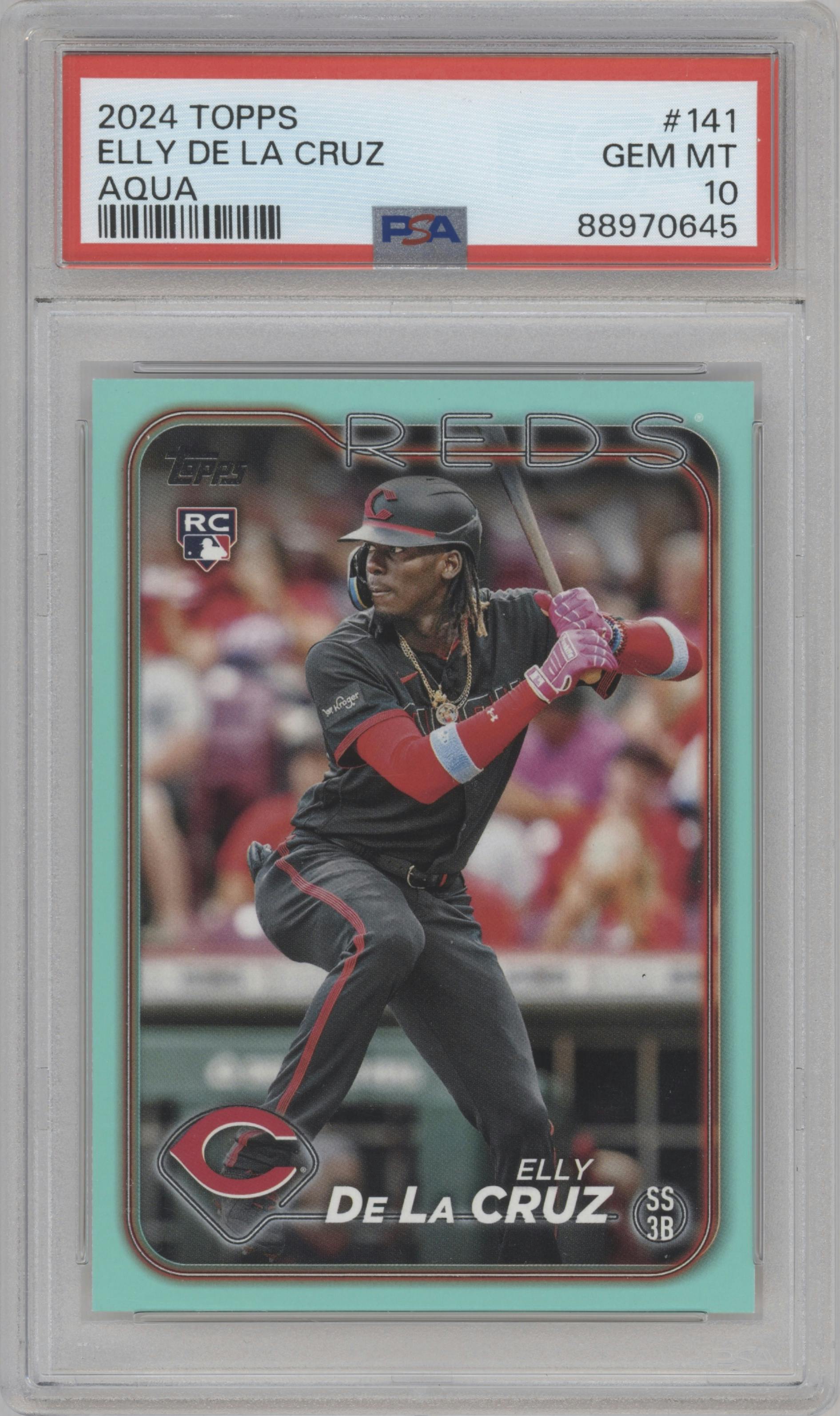 Elly De La Cruz from the 2024 Topps  set featuring a Aqua parallel graded by PSA and given an overall grade of 10.