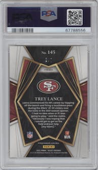 Trey Lance from the 2021 Panini Select set featuring a Neon Orange Pulsar parallel graded by PSA and given an overall grade of 9.