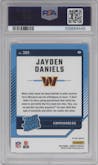 Jayden Daniels from the 2024 Donruss set featuring a Pink parallel graded by PSA and given an overall grade of 9.