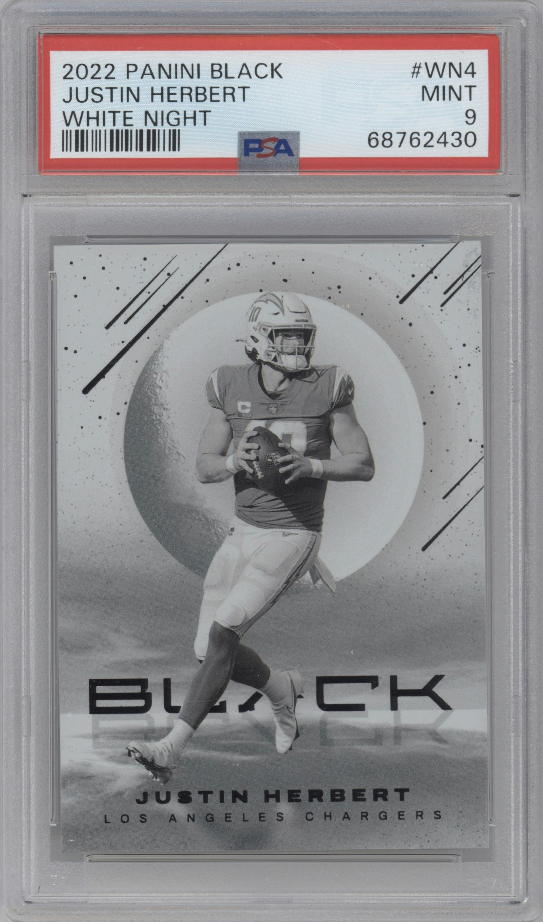 Justin Herbert from the 2022 Panini Black set graded by PSA and given an overall grade of 9.