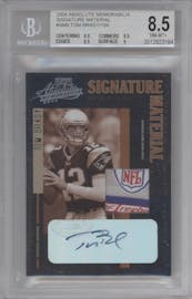 Tom Brady from the 2004 Absolute Memorabilia set graded by Beckett and given an overall grade of 8.5.