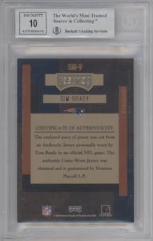 Tom Brady from the 2004 Absolute Memorabilia set graded by Beckett and given an overall grade of 8.5.