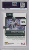 Garrett Wilson from the 2022 Panini Donruss Optic set featuring a Purple Shock parallel graded by PSA and given an overall grade of 9.