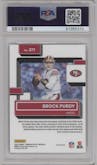 Brock Purdy from the 2022 Panini Donruss Optic set featuring a Jazz parallel graded by PSA and given an overall grade of 10.