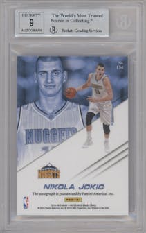 Nikola Jokic from the 2015-16 Panini Preferred set featuring a Purple parallel graded by Beckett and given an overall grade of 8.5.