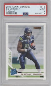 DK Metcalf from the 2019 Panini Donruss set featuring a Canvas parallel graded by PSA and given an overall grade of 9.