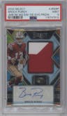 Brock Purdy from the 2022 Panini Select set featuring a Tie-Dye parallel graded by PSA and given an overall grade of 9.