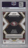 Brock Purdy from the 2022 Panini Select set featuring a Tie-Dye parallel graded by PSA and given an overall grade of 9.