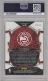 Trae Young from the 2022-23 Panini Select set featuring a Cosmic parallel graded by PSA and given an overall grade of 10.