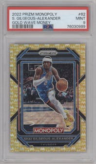 Shai Gilgeous-Alexander from the 2022-23 Panini Prizm Monopoly set featuring a Gold Wave Money parallel graded by PSA and given an overall grade of 9.