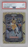 LeBron James from the 2022-23 Panini Prizm Monopoly set featuring a Gold Money Shimmer parallel graded by PSA and given an overall grade of 9.