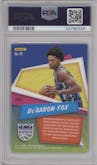 De'Aaron Fox from the 2017-18 Panini Revolution set featuring a Groove parallel graded by PSA and given an overall grade of 10.