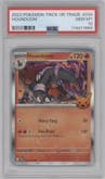 Houndoom from the 2023 Pokemon SV set featuring a Trick Or Trade parallel graded by PSA and given an overall grade of 10.