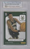 Giannis Antetokounmpo from the 2016-17 Panini Excalibur set graded by Beckett and given an overall grade of 8.5.