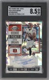 Chase Brown from the 2023 Panini Contenders Optic set featuring a Cracked Ice parallel graded by SGC and given an overall grade of 8.5.