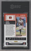 Chase Brown from the 2023 Panini Contenders Optic set featuring a Cracked Ice parallel graded by SGC and given an overall grade of 8.5.