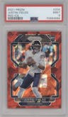 Justin Fields from the 2021 Panini Prizm set featuring a Red Ice parallel graded by PSA and given an overall grade of 9.