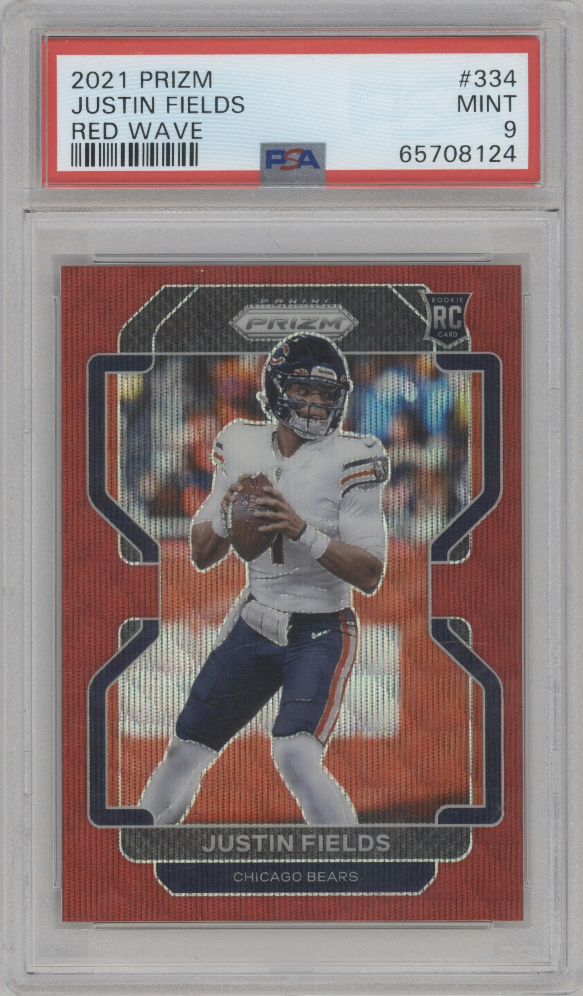 Justin Fields from the 2021 Panini Prizm set featuring a Red Wave parallel graded by PSA and given an overall grade of 9.