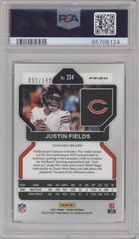 Justin Fields from the 2021 Panini Prizm set featuring a Red Wave parallel graded by PSA and given an overall grade of 9.