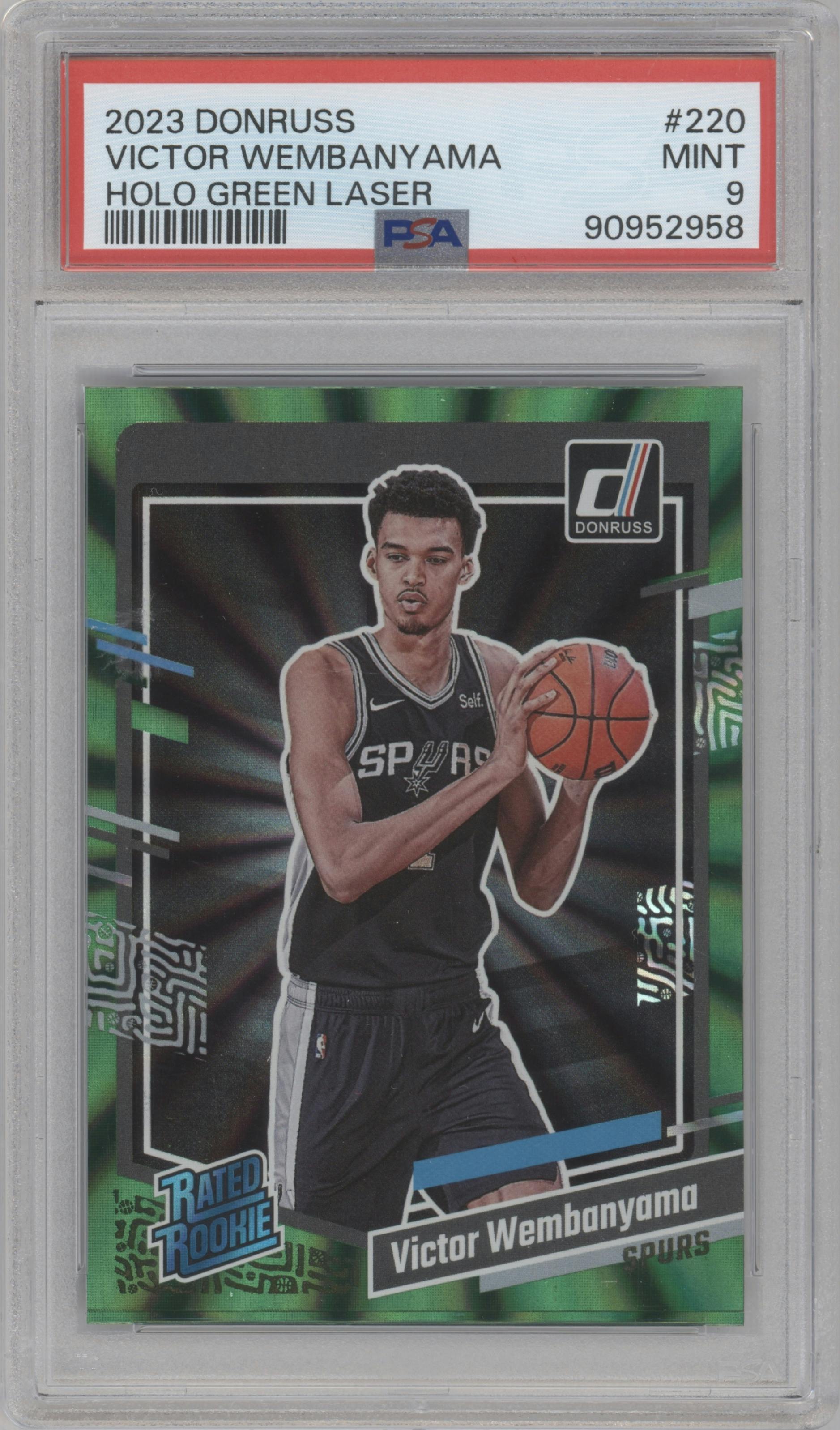 Victor Wembanyama from the 2023-24 Panini Donruss set featuring a Green Holo Laser  parallel graded by PSA and given an overall grade of 9.