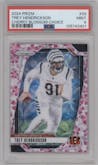 Trey Hendrickson from the 2024 Panini Prizm set featuring a Choice Cherry Blossom Prizm parallel graded by PSA and given an overall grade of 9.