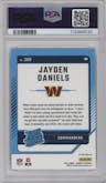 Jayden Daniels from the 2024 Donruss set featuring a Pink parallel graded by PSA and given an overall grade of 9.