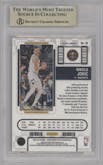 Nikola Jokic from the 2022-23 Panini Contenders Optic set featuring a Gold Vinyl parallel graded by Beckett and given an overall grade of 9.5.