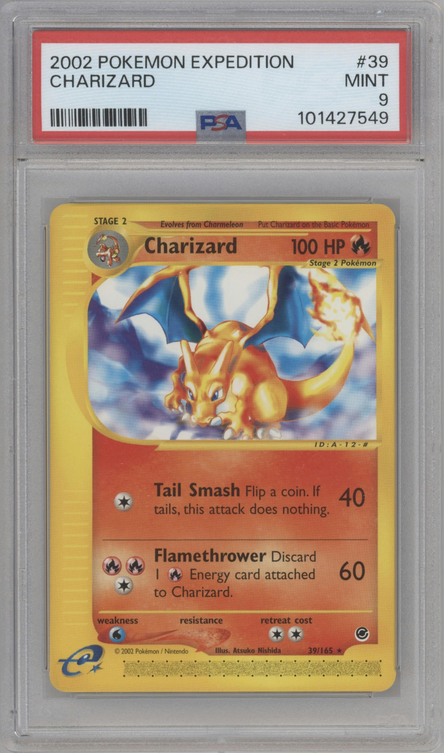 Charizard from the 2002 Pokemon E-CARD set graded by PSA and given an overall grade of 9.