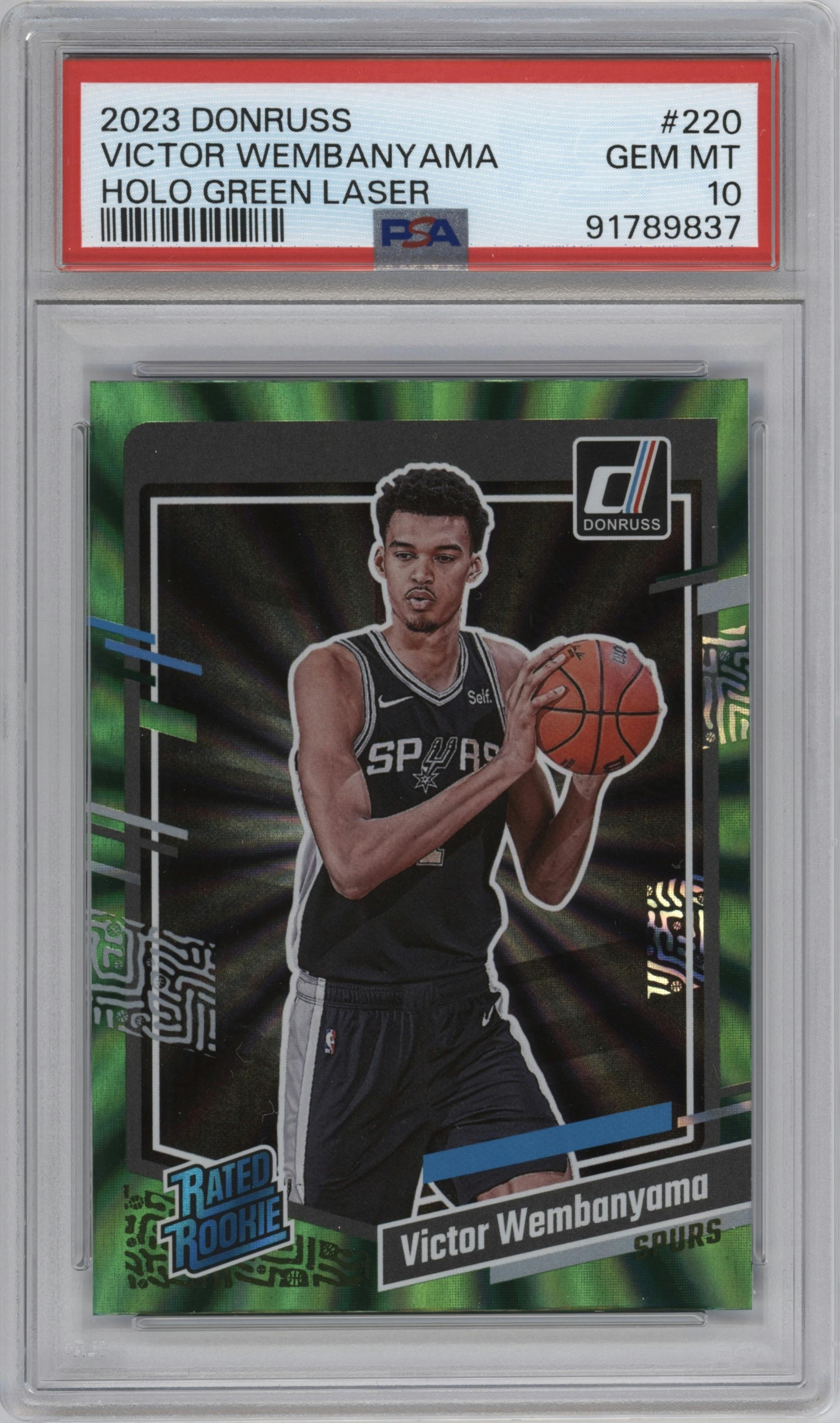 Victor Wembanyama from the 2023-24 Panini Donruss set featuring a Green Holo Laser  parallel graded by PSA and given an overall grade of 10.