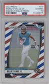 Brian Thomas Jr. from the 2024 Panini Prizm set featuring a Red White Blue Prizm parallel graded by PSA and given an overall grade of 10.