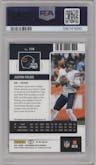 Justin Fields from the 2021 Panini Contenders Optic set featuring a Teal parallel graded by PSA and given an overall grade of 9.