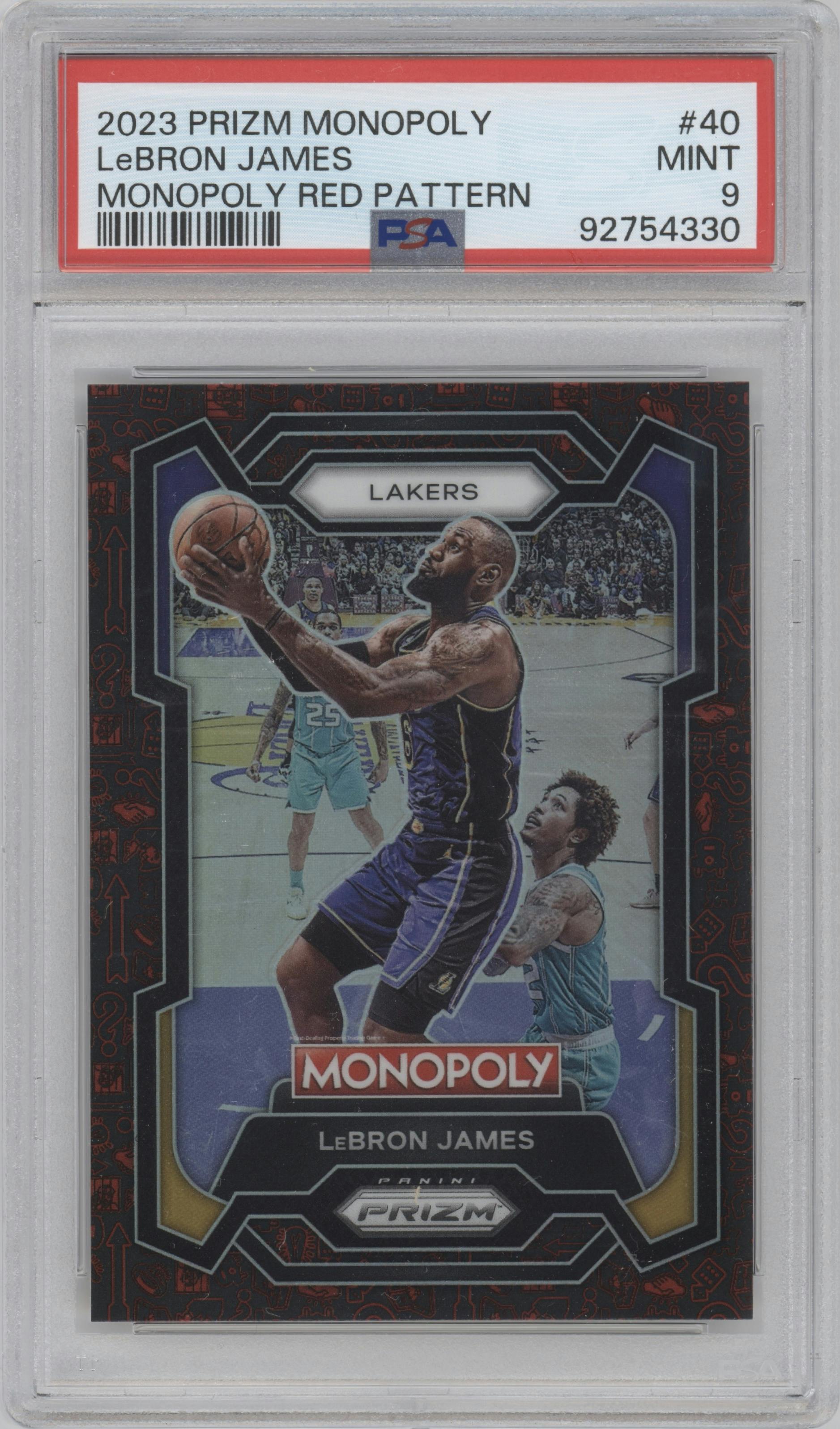 LeBron James from the 2023-24 Panini Prizm Monopoly set featuring a Red Monopoly Symbols Prizm parallel graded by PSA and given an overall grade of 9.