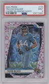Travon Walker from the 2024 Panini Prizm set featuring a Choice Cherry Blossom Prizm parallel graded by PSA and given an overall grade of 9.
