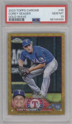 Corey Seager from the 2023 Topps Chrome set featuring a Gold Wave Refractor parallel graded by PSA and given an overall grade of 10.