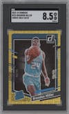Brandon Miller from the 2023-24 Panini Donruss set featuring a Choice Gold parallel graded by SGC and given an overall grade of 8.5.