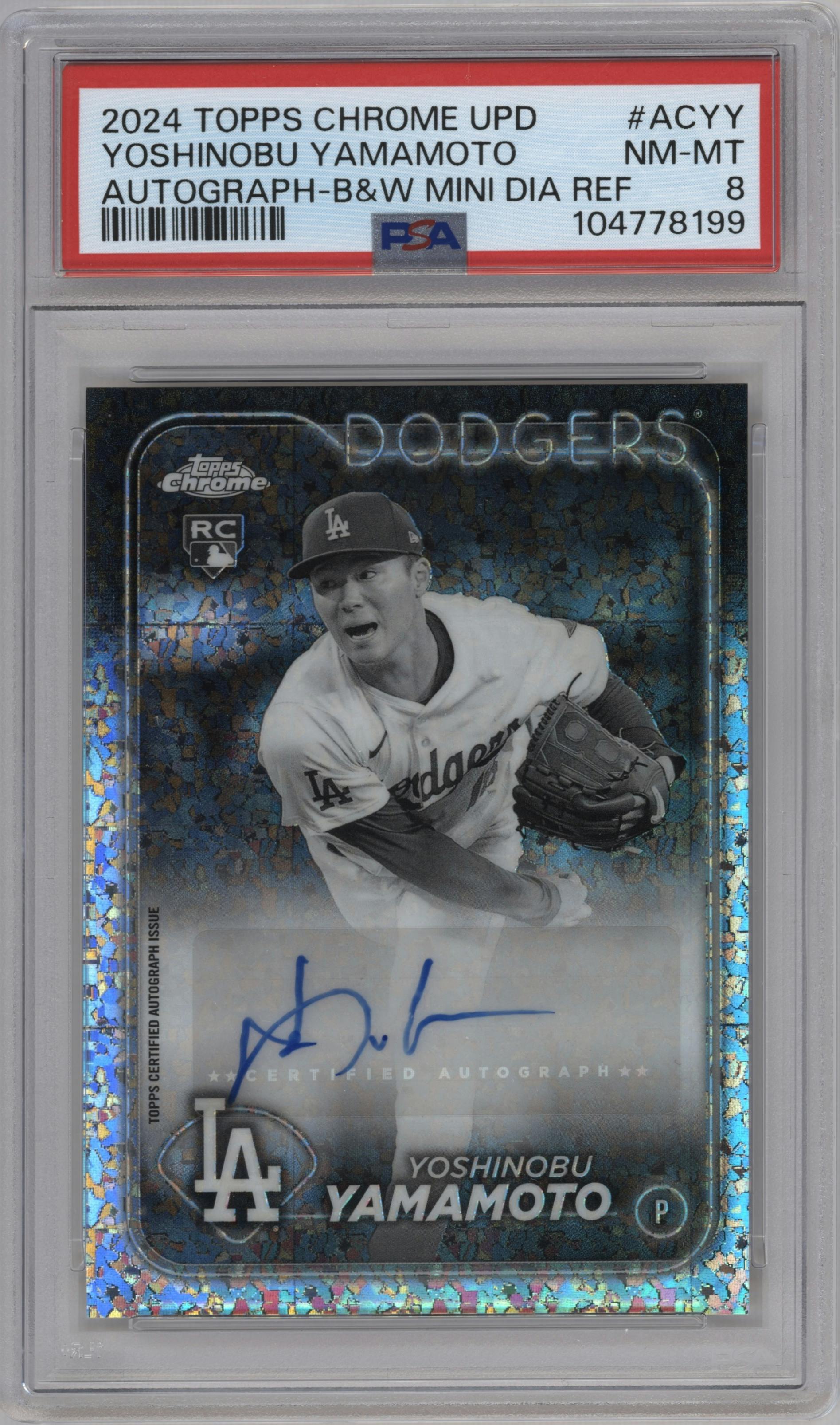 Yoshinobu Yamamoto from the 2024 Topps Chrome Update set featuring a Black & White Mini-Diamond Refractor parallel graded by PSA and given an overall grade of 8.